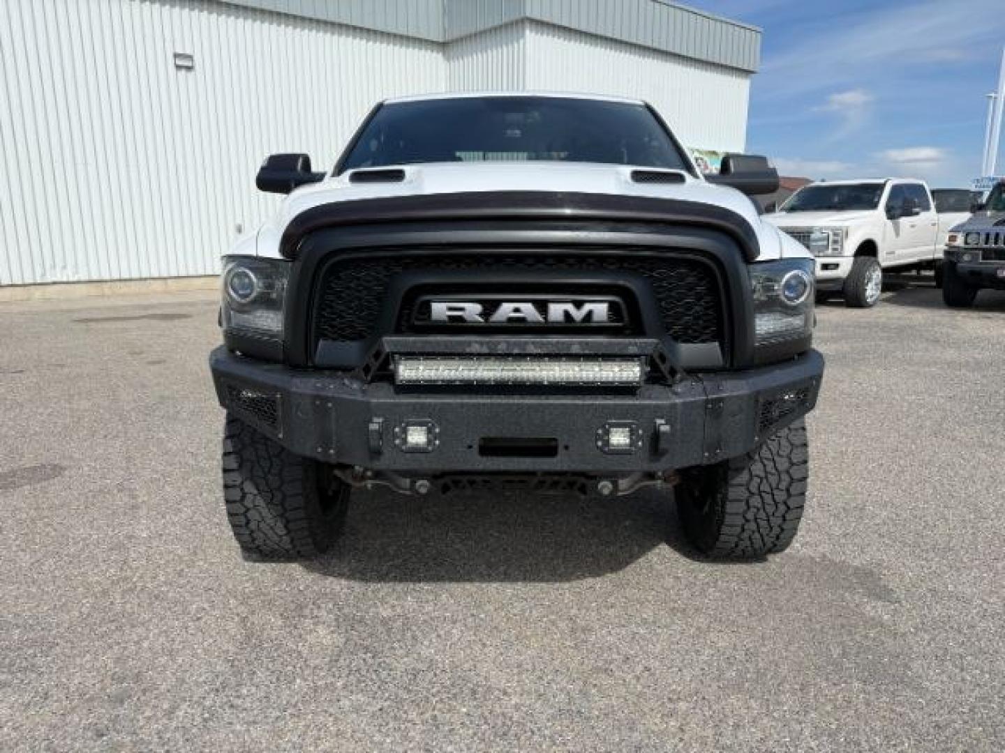 2017 Bright White Clearcoat /Red/Black Ram 1500 Rebel Crew Cab 4x4 5'7 Box (1C6RR7YT3HS) with an HEMI 5.7L V-8 variable valve control engine, AUTOMATIC transmission, located at 1235 N Woodruff Ave., Idaho Falls, 83401, (208) 523-1053, 43.507172, -112.000488 - At Timberline Auto, finding a great deal on your next vehicle is always easy! Our experienced sales staff goal is to help find you the right vehicle at the right price! Our knowledgeable finance department has options for almost any credit score. We offer extended service contract options to prot - Photo#37