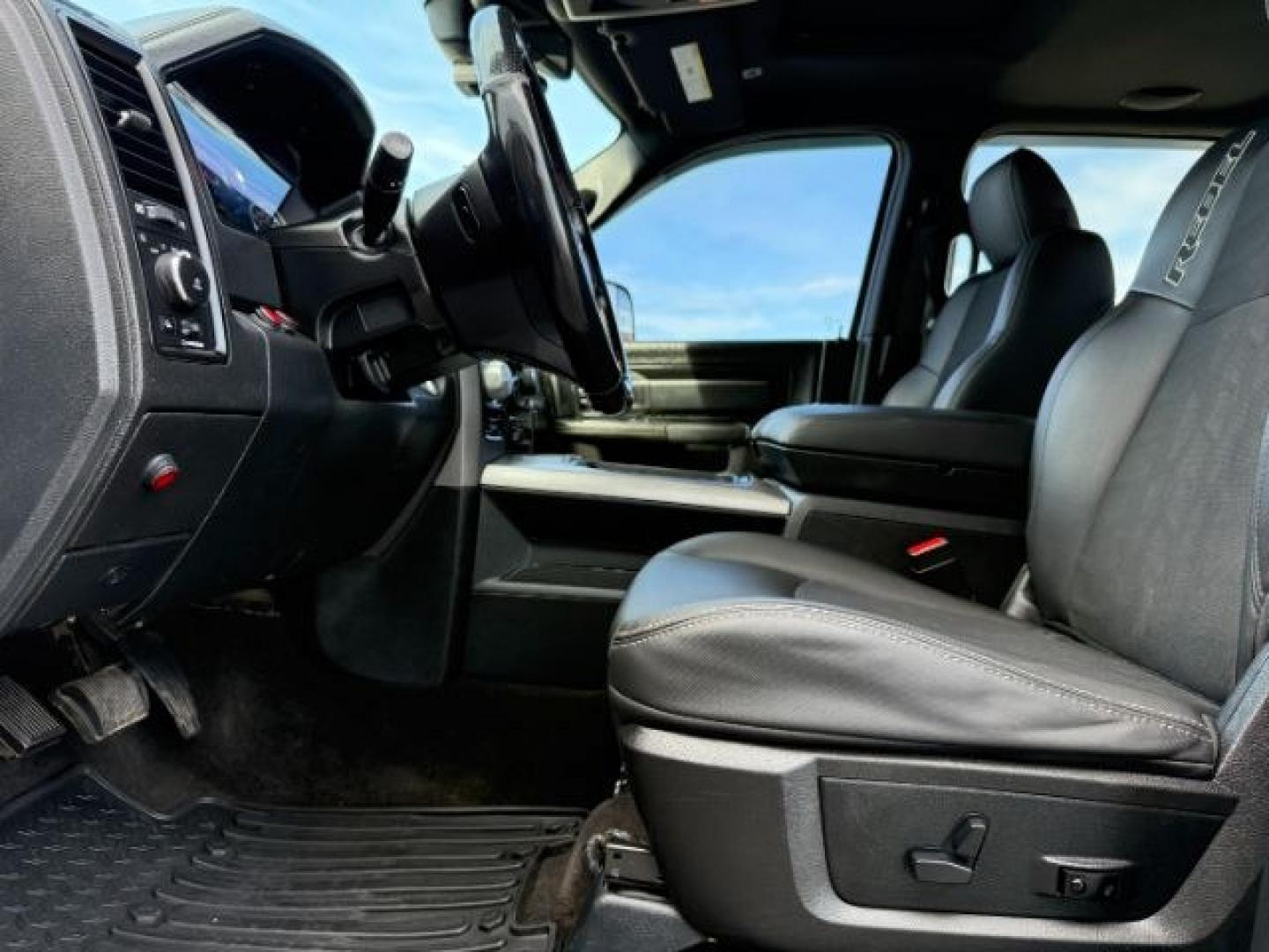 2017 Bright White Clearcoat /Red/Black Ram 1500 Rebel Crew Cab 4x4 5'7 Box (1C6RR7YT3HS) with an HEMI 5.7L V-8 variable valve control engine, AUTOMATIC transmission, located at 1235 N Woodruff Ave., Idaho Falls, 83401, (208) 523-1053, 43.507172, -112.000488 - At Timberline Auto, finding a great deal on your next vehicle is always easy! Our experienced sales staff goal is to help find you the right vehicle at the right price! Our knowledgeable finance department has options for almost any credit score. We offer extended service contract options to prot - Photo#41