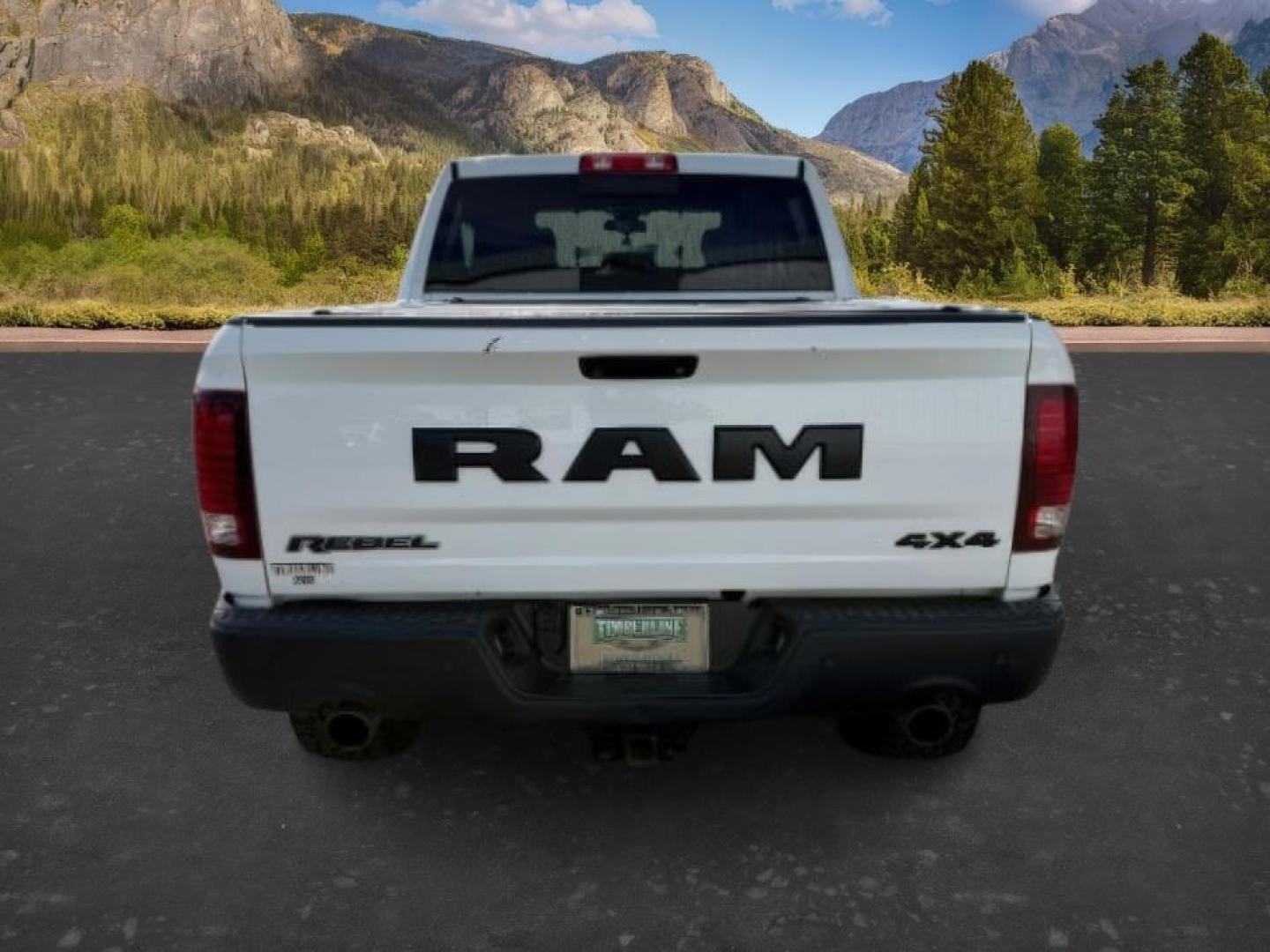 2017 Bright White Clearcoat /Red/Black Ram 1500 Rebel Crew Cab 4x4 5'7 Box (1C6RR7YT3HS) with an HEMI 5.7L V-8 variable valve control engine, AUTOMATIC transmission, located at 1235 N Woodruff Ave., Idaho Falls, 83401, (208) 523-1053, 43.507172, -112.000488 - At Timberline Auto, finding a great deal on your next vehicle is always easy! Our experienced sales staff goal is to help find you the right vehicle at the right price! Our knowledgeable finance department has options for almost any credit score. We offer extended service contract options to prot - Photo#3