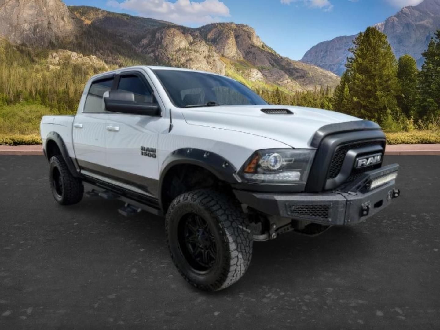 2017 Bright White Clearcoat /Red/Black Ram 1500 Rebel Crew Cab 4x4 5'7 Box (1C6RR7YT3HS) with an HEMI 5.7L V-8 variable valve control engine, AUTOMATIC transmission, located at 1235 N Woodruff Ave., Idaho Falls, 83401, (208) 523-1053, 43.507172, -112.000488 - At Timberline Auto, finding a great deal on your next vehicle is always easy! Our experienced sales staff goal is to help find you the right vehicle at the right price! Our knowledgeable finance department has options for almost any credit score. We offer extended service contract options to prot - Photo#8