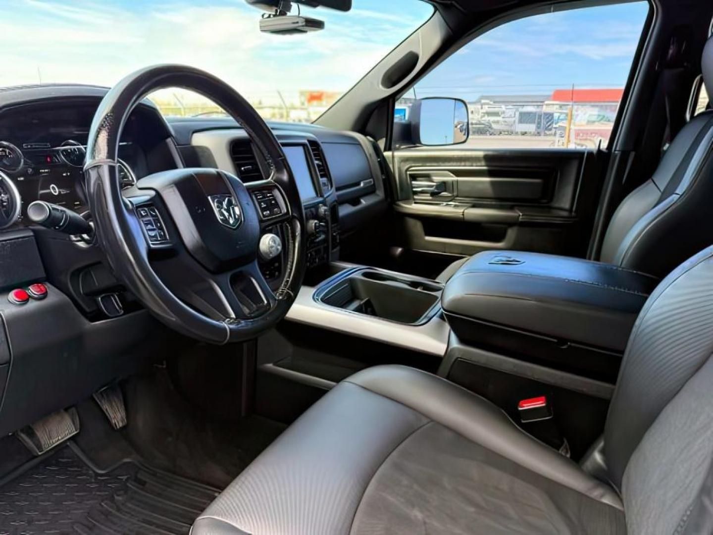 2017 Bright White Clearcoat /Red/Black Ram 1500 Rebel Crew Cab 4x4 5'7 Box (1C6RR7YT3HS) with an HEMI 5.7L V-8 variable valve control engine, AUTOMATIC transmission, located at 1235 N Woodruff Ave., Idaho Falls, 83401, (208) 523-1053, 43.507172, -112.000488 - At Timberline Auto, finding a great deal on your next vehicle is always easy! Our experienced sales staff goal is to help find you the right vehicle at the right price! Our knowledgeable finance department has options for almost any credit score. We offer extended service contract options to prot - Photo#14