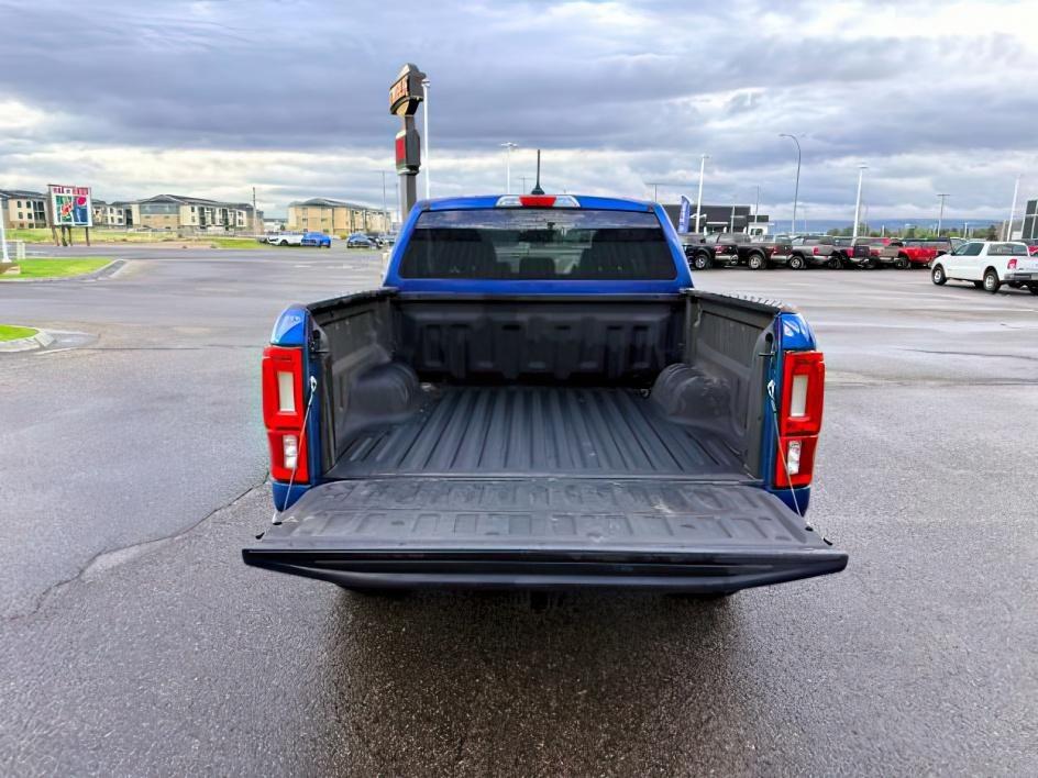 2020 BLUE /CLOTH Ford Ranger XLT (1FTER4FHXLL) with an 2.3L I4 engine, AUTOMATIC transmission, located at 1235 N Woodruff Ave., Idaho Falls, 83401, (208) 523-1053, 43.507172, -112.000488 - Extra passenger room and everyday truck practicality come together in this 2020 Ford Ranger SuperCrew 4x4, giving drivers the flexibility of a midsize pickup with space for both passengers and cargo. Equipped with a turbocharged 2.3L EcoBoost engine and four wheel drive capability, this Ranger pairs- Photo#5