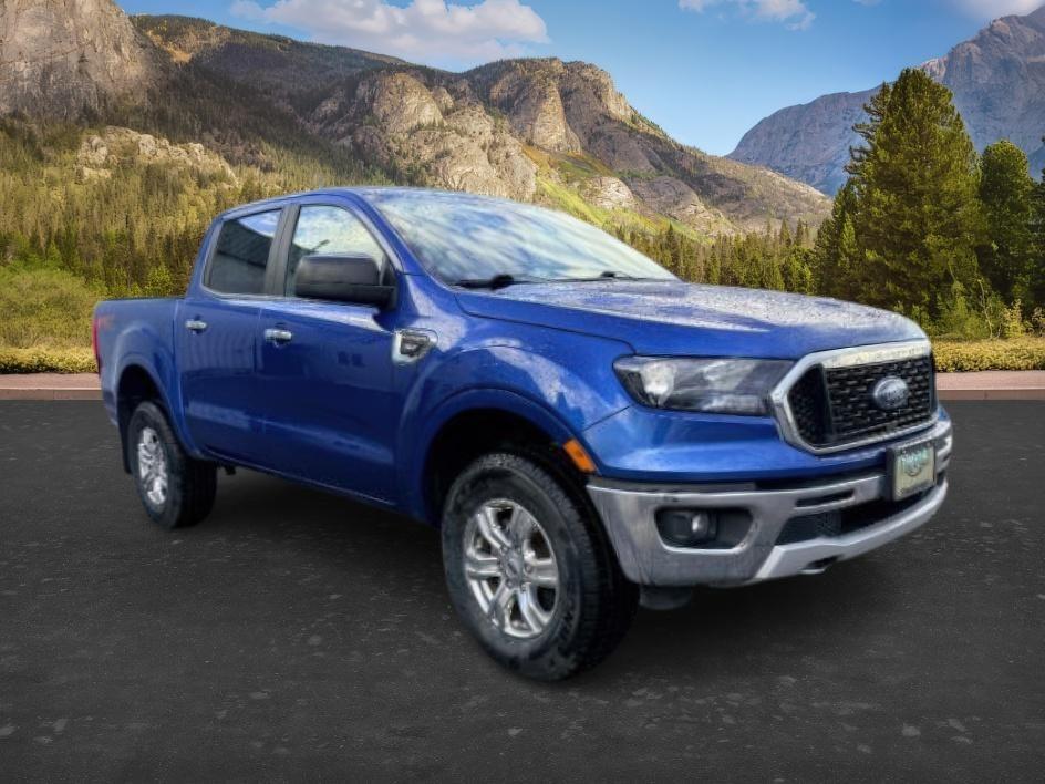 2020 BLUE /CLOTH Ford Ranger XLT (1FTER4FHXLL) with an 2.3L I4 engine, AUTOMATIC transmission, located at 1235 N Woodruff Ave., Idaho Falls, 83401, (208) 523-1053, 43.507172, -112.000488 - Extra passenger room and everyday truck practicality come together in this 2020 Ford Ranger SuperCrew 4x4, giving drivers the flexibility of a midsize pickup with space for both passengers and cargo. Equipped with a turbocharged 2.3L EcoBoost engine and four wheel drive capability, this Ranger pairs- Photo#8