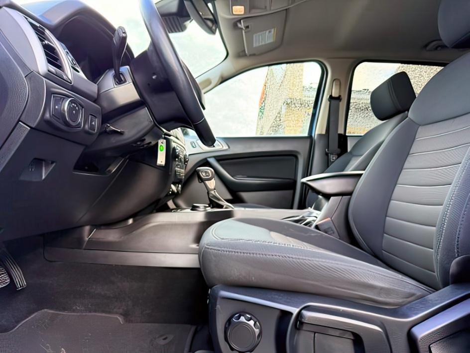 2020 BLUE /CLOTH Ford Ranger XLT (1FTER4FHXLL) with an 2.3L I4 engine, AUTOMATIC transmission, located at 1235 N Woodruff Ave., Idaho Falls, 83401, (208) 523-1053, 43.507172, -112.000488 - Extra passenger room and everyday truck practicality come together in this 2020 Ford Ranger SuperCrew 4x4, giving drivers the flexibility of a midsize pickup with space for both passengers and cargo. Equipped with a turbocharged 2.3L EcoBoost engine and four wheel drive capability, this Ranger pairs- Photo#13