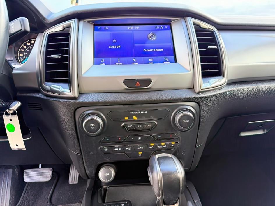 2020 BLUE /CLOTH Ford Ranger XLT (1FTER4FHXLL) with an 2.3L I4 engine, AUTOMATIC transmission, located at 1235 N Woodruff Ave., Idaho Falls, 83401, (208) 523-1053, 43.507172, -112.000488 - Extra passenger room and everyday truck practicality come together in this 2020 Ford Ranger SuperCrew 4x4, giving drivers the flexibility of a midsize pickup with space for both passengers and cargo. Equipped with a turbocharged 2.3L EcoBoost engine and four wheel drive capability, this Ranger pairs- Photo#16