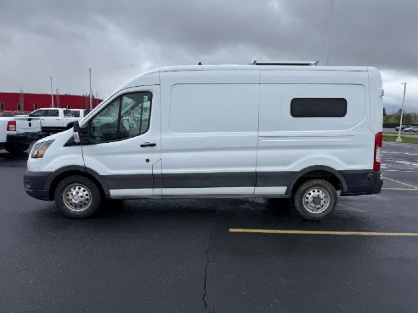2021 WHITE /CLOTH Ford Transit-250 Cargo Van (1FTBR2CG7MK) with an 35L V6 ECOBOOST engine, Automatic transmission, located at 1175 N Woodruff Ave, Idaho Falls, ID, 83401, 43.506901, -111.999657 - At Timberline Auto, finding a great deal on your next vehicle is always easy! Our experienced sales staff goal is to help find you the right vehicle at the right price! Our knowledgeable finance department has options for almost any credit score. We offer extended service contract options to prot - Photo#1
