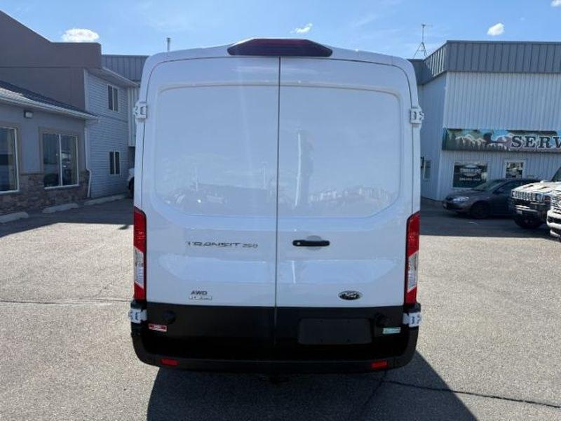 2021 Oxford White /Ebony Ford Transit Van Base (1FTBR2CG7MK) with an V6, 3.5L engine, 10-speed automatic transmission, located at 1175 N Woodruff Ave, Idaho Falls, ID, 83401, 43.506901, -111.999657 - <b>Vehicle Details</b><br>This 2021 Ford Transit Van EL T-250 Med Roof Slide Base is a versatile and capable full-size van designed to handle demanding commercial and passenger transport needs with confidence. With only 32,484 miles, it offers plenty of life left for business use, fleet expansion, o- Photo#3