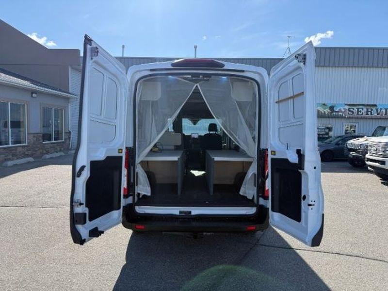 2021 Oxford White /Ebony Ford Transit Van Base (1FTBR2CG7MK) with an V6, 3.5L engine, 10-speed automatic transmission, located at 1175 N Woodruff Ave, Idaho Falls, ID, 83401, 43.506901, -111.999657 - <b>Vehicle Details</b><br>This 2021 Ford Transit Van EL T-250 Med Roof Slide Base is a versatile and capable full-size van designed to handle demanding commercial and passenger transport needs with confidence. With only 32,484 miles, it offers plenty of life left for business use, fleet expansion, o- Photo#4