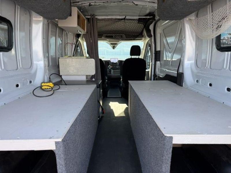 2021 Oxford White /Ebony Ford Transit Van Base (1FTBR2CG7MK) with an V6, 3.5L engine, 10-speed automatic transmission, located at 1175 N Woodruff Ave, Idaho Falls, ID, 83401, 43.506901, -111.999657 - <b>Vehicle Details</b><br>This 2021 Ford Transit Van EL T-250 Med Roof Slide Base is a versatile and capable full-size van designed to handle demanding commercial and passenger transport needs with confidence. With only 32,484 miles, it offers plenty of life left for business use, fleet expansion, o- Photo#5