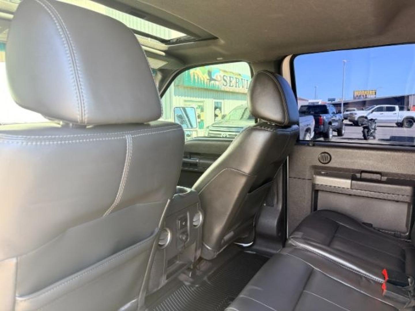 2011 WHITE /LEATHER Ford Super Duty F-350 SRW (1FT8W3BT2BE) with an 67L engine, Automatic transmission, located at 1175 N Woodruff Ave, Idaho Falls, ID, 83401, 43.506901, -111.999657 - At Timberline Auto, finding a great deal on your next vehicle is always easy! Our experienced sales staff goal is to help find you the right vehicle at the right price! Our knowledgeable finance department has options for almost any credit score. We offer extended service contract options to prot- Photo#48