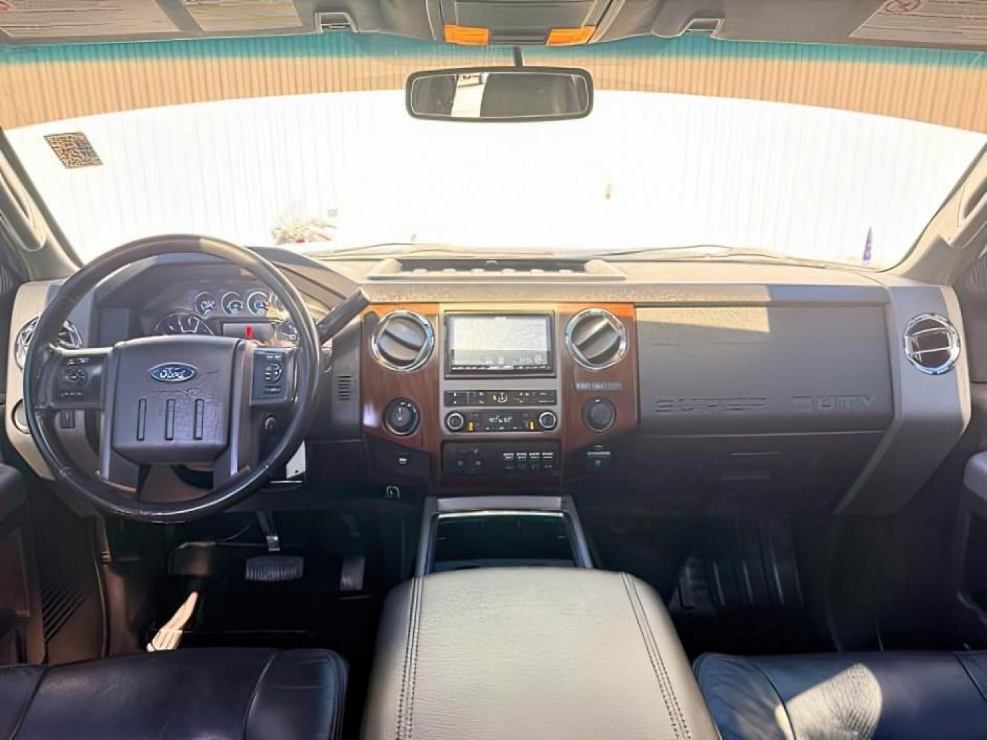 2011 WHITE /LEATHER Ford Super Duty F-350 SRW (1FT8W3BT2BE) with an 67L engine, Automatic transmission, located at 1175 N Woodruff Ave, Idaho Falls, ID, 83401, 43.506901, -111.999657 - At Timberline Auto, finding a great deal on your next vehicle is always easy! Our experienced sales staff goal is to help find you the right vehicle at the right price! Our knowledgeable finance department has options for almost any credit score. We offer extended service contract options to prot- Photo#21
