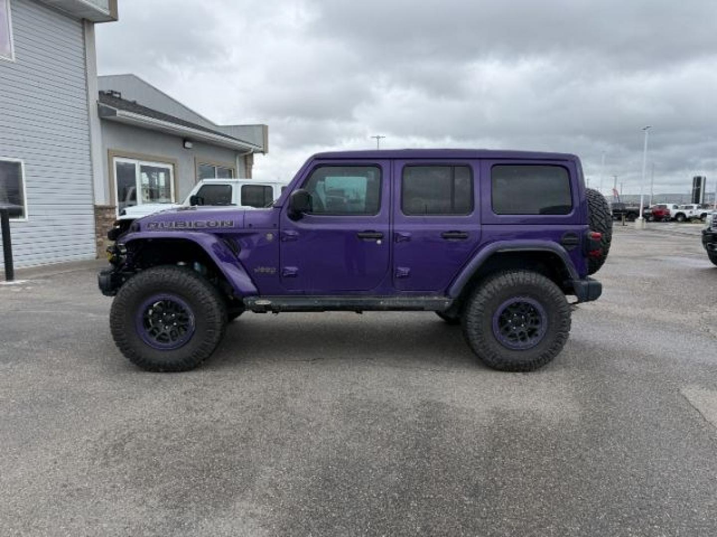 2023 PURPLE /Black Jeep Wrangler (1C4JJXSJ6PW) with an HEMI 64L V-8 premium unleaded engine, Automatic transmission, located at 1175 N Woodruff Ave, Idaho Falls, ID, 83401, 43.506901, -111.999657 - At Timberline Auto, finding a great deal on your next vehicle is always easy! Our experienced sales staff goal is to help find you the right vehicle at the right price! Our knowledgeable finance department has options for almost any credit score. We offer extended service contract options to prot - Photo#1