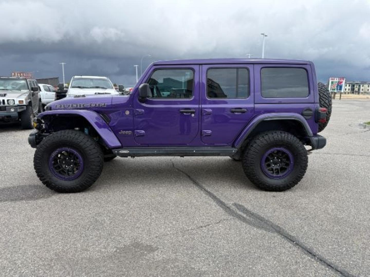 2023 PURPLE /Black Jeep Wrangler 4-Door Rubicon 392 4x4 (1C4JJXSJ6PW) with an HEMI 6.4L V-8 premium unleaded engine, AUTOMATIC transmission, located at 1235 N Woodruff Ave., Idaho Falls, 83401, (208) 523-1053, 43.507172, -112.000488 - At Timberline Auto, finding a great deal on your next vehicle is always easy! Our experienced sales staff goal is to help find you the right vehicle at the right price! Our knowledgeable finance department has options for almost any credit score. We offer extended service contract options to prot - Photo#31