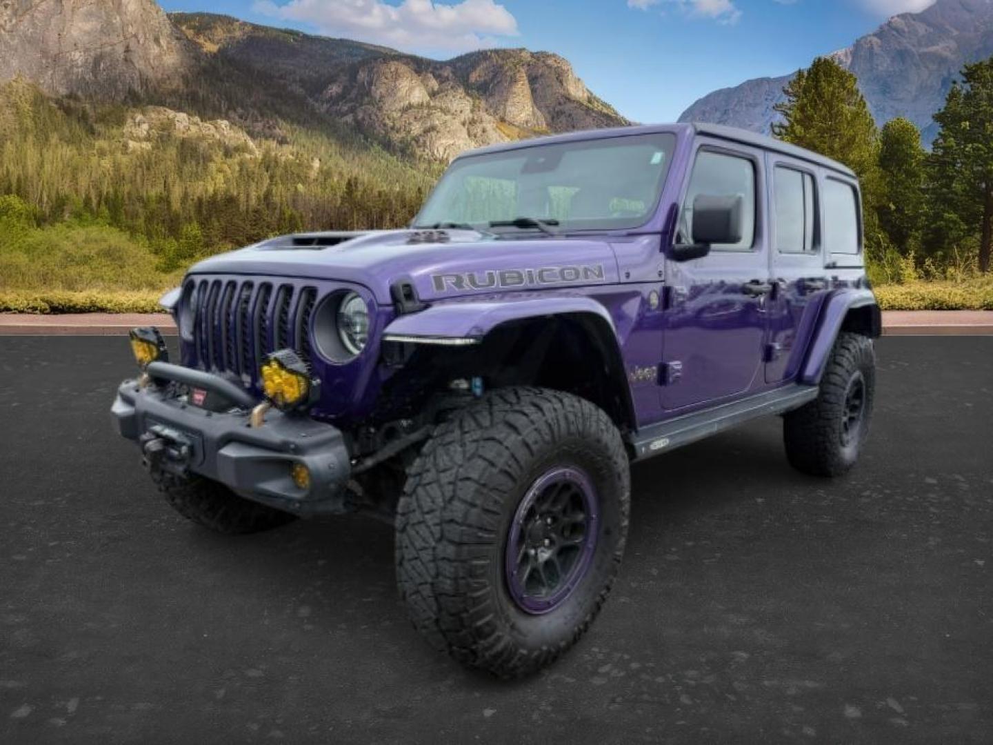 2023 PURPLE /Black Jeep Wrangler 4-Door Rubicon 392 4x4 (1C4JJXSJ6PW) with an HEMI 6.4L V-8 premium unleaded engine, AUTOMATIC transmission, located at 1235 N Woodruff Ave., Idaho Falls, 83401, (208) 523-1053, 43.507172, -112.000488 - At Timberline Auto, finding a great deal on your next vehicle is always easy! Our experienced sales staff goal is to help find you the right vehicle at the right price! Our knowledgeable finance department has options for almost any credit score. We offer extended service contract options to prot - Photo#0
