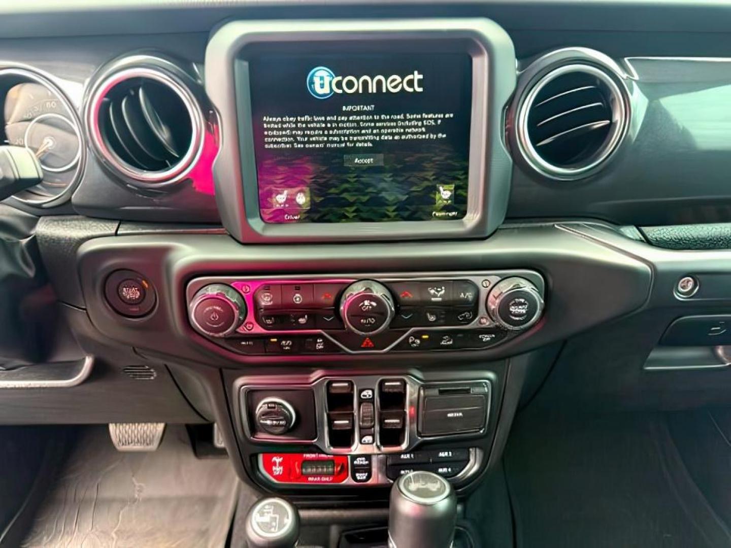 2023 PURPLE /Black Jeep Wrangler 4-Door Rubicon 392 4x4 (1C4JJXSJ6PW) with an HEMI 6.4L V-8 premium unleaded engine, AUTOMATIC transmission, located at 1235 N Woodruff Ave., Idaho Falls, 83401, (208) 523-1053, 43.507172, -112.000488 - At Timberline Auto, finding a great deal on your next vehicle is always easy! Our experienced sales staff goal is to help find you the right vehicle at the right price! Our knowledgeable finance department has options for almost any credit score. We offer extended service contract options to prot - Photo#17