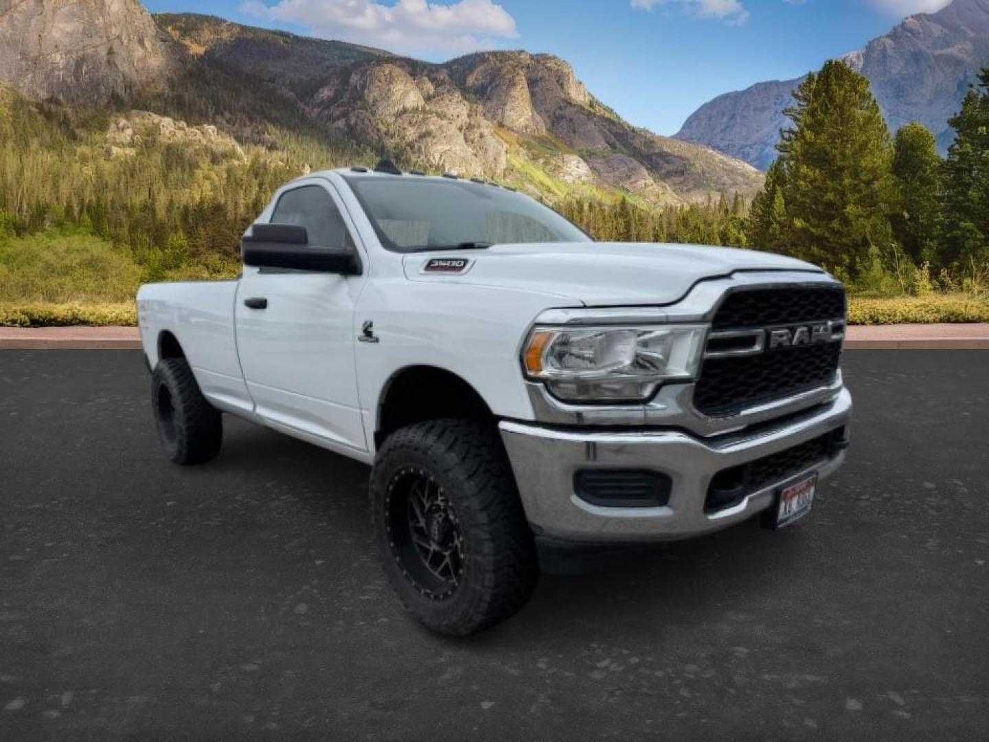 2020 WHITE /Diesel Gray/Black Ram 3500 Tradesman Regular Cab 4x4 8' Box (3C63R3AL1LG) with an Cummins High Output 6.7L I-6 diesel direct injecti engine, AUTOMATIC transmission, located at 1235 N Woodruff Ave., Idaho Falls, 83401, (208) 523-1053, 43.507172, -112.000488 - At Timberline Auto, finding a great deal on your next vehicle is always easy! Our experienced sales staff goal is to help find you the right vehicle at the right price! Our knowledgeable finance department has options for almost any credit score. We offer extended service contract options to prot - Photo#8