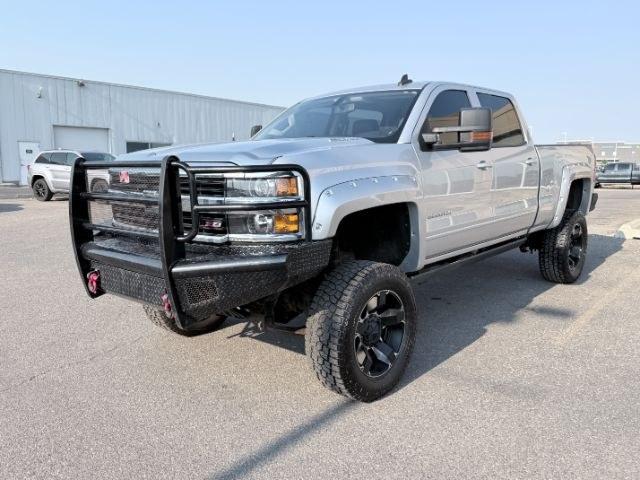 2015 SILVER /Dark Ash/Jet Black Chevrolet Silverado 3500HD (1GC4KZC85FF) with an 66L V8 16V OHV TURBO DIESEL engine, Automatic transmission, located at 1175 N Woodruff Ave, Idaho Falls, ID, 83401, 43.506901, -111.999657 - At Timberline Auto, finding a great deal on your next vehicle is always easy! Our experienced sales staff goal is to help find you the right vehicle at the right price! Our knowledgeable finance department has options for almost any credit score. We offer extended service contract options to prot- Photo#29