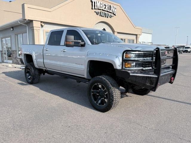 2015 SILVER /Dark Ash/Jet Black Chevrolet Silverado 3500HD (1GC4KZC85FF) with an 66L V8 16V OHV TURBO DIESEL engine, Automatic transmission, located at 1175 N Woodruff Ave, Idaho Falls, ID, 83401, 43.506901, -111.999657 - At Timberline Auto, finding a great deal on your next vehicle is always easy! Our experienced sales staff goal is to help find you the right vehicle at the right price! Our knowledgeable finance department has options for almost any credit score. We offer extended service contract options to prot- Photo#37