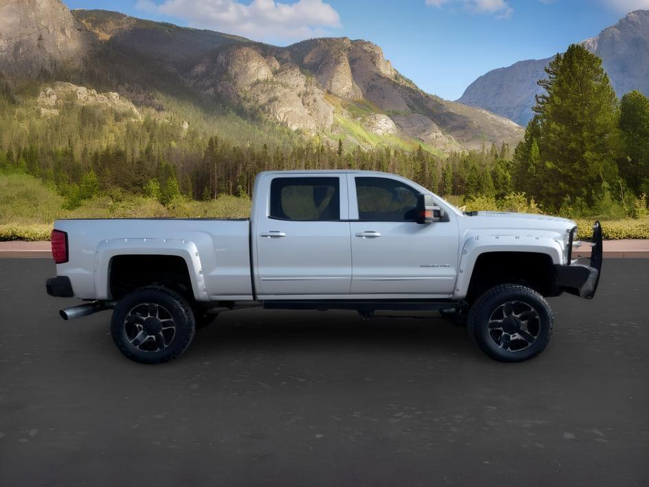 2015 SILVER /Dark Ash/Jet Black Chevrolet Silverado 3500HD (1GC4KZC85FF) with an 66L V8 16V OHV TURBO DIESEL engine, Automatic transmission, located at 1175 N Woodruff Ave, Idaho Falls, ID, 83401, 43.506901, -111.999657 - At Timberline Auto, finding a great deal on your next vehicle is always easy! Our experienced sales staff goal is to help find you the right vehicle at the right price! Our knowledgeable finance department has options for almost any credit score. We offer extended service contract options to prot- Photo#7