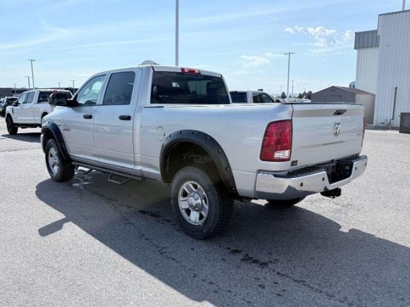 2015 Bright Silver Metallic Clearcoat /Diesel Gray/Black Ram 2500 Tradesman (3C6UR5CJ2FG) with an V8, 6.4L engine, 6-speed automatic transmission, located at 1175 N Woodruff Ave, Idaho Falls, ID, 83401, 43.506901, -111.999657 - <b>Vehicle Details</b><br>This pre-owned 2015 Ram 2500 Tradesman is a hardworking heavy-duty pickup built to handle demanding jobs with confidence. Powered by a proven V8 6.4L Gasoline engine and equipped with 4WD, this Ram 2500 delivers the strength, traction, and capability drivers need for towing- Photo#2