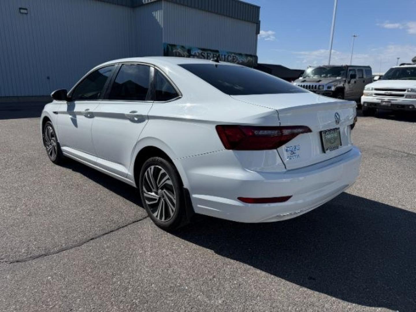2021 WHITE /Titan Black Volkswagen Jetta 1.4T SEL (3VWE57BU6MM) with an 1.4L I-4 gasoline direct injection engine, AUTOMATIC transmission, located at 1235 N Woodruff Ave., Idaho Falls, 83401, (208) 523-1053, 43.507172, -112.000488 - Photo#29