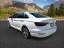 2021 WHITE /Titan Black Volkswagen Jetta 1.4T SEL (3VWE57BU6MM) with an 1.4L I-4 gasoline direct injection engine, AUTOMATIC transmission, located at 1235 N Woodruff Ave., Idaho Falls, 83401, (208) 523-1053, 43.507172, -112.000488 - Photo#2