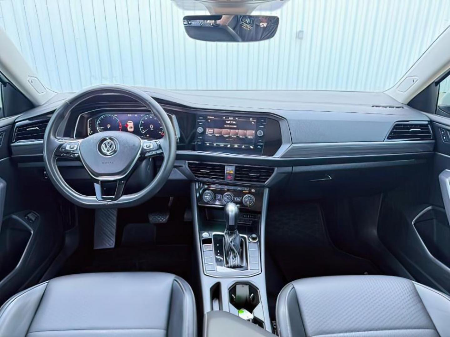 2021 WHITE /Titan Black Volkswagen Jetta 1.4T SEL (3VWE57BU6MM) with an 1.4L I-4 gasoline direct injection engine, AUTOMATIC transmission, located at 1235 N Woodruff Ave., Idaho Falls, 83401, (208) 523-1053, 43.507172, -112.000488 - Photo#23