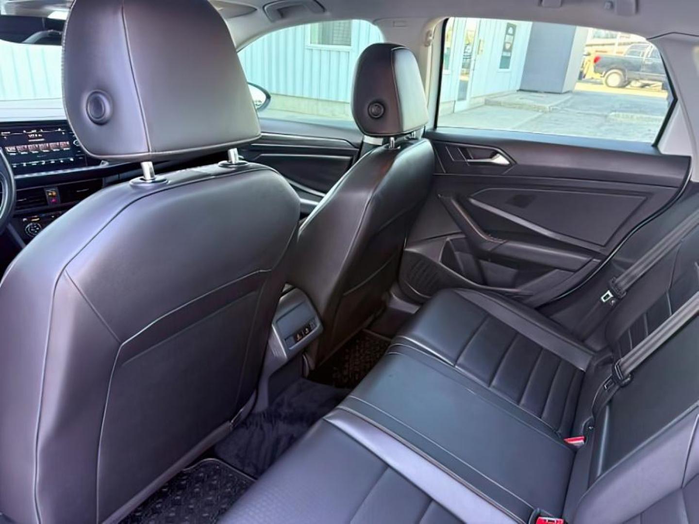 2021 WHITE /Titan Black Volkswagen Jetta 1.4T SEL (3VWE57BU6MM) with an 1.4L I-4 gasoline direct injection engine, AUTOMATIC transmission, located at 1235 N Woodruff Ave., Idaho Falls, 83401, (208) 523-1053, 43.507172, -112.000488 - Photo#25