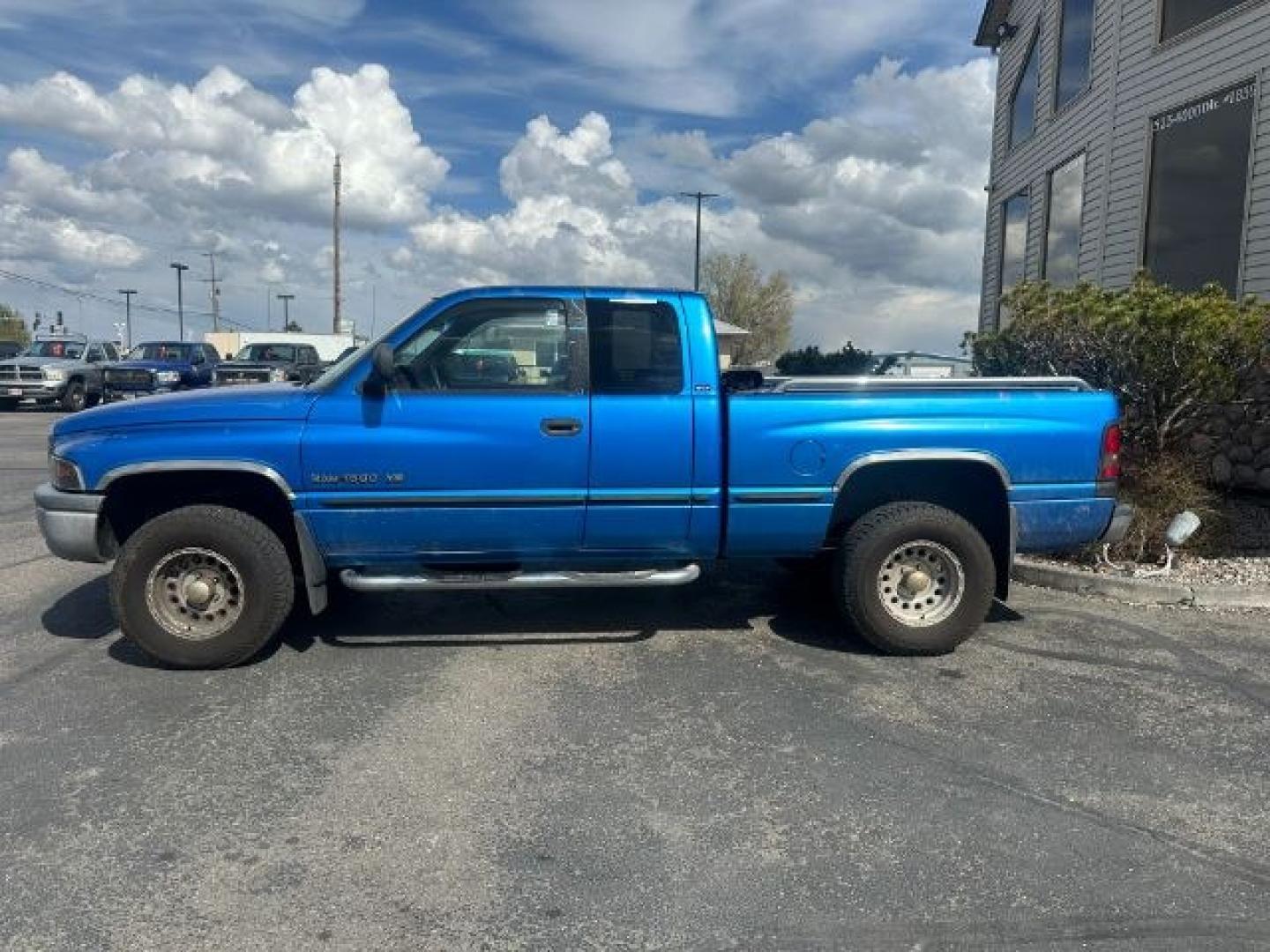 1999 BLUE /Mist Gray Dodge Ram 1500 (1B7HF13Z6XJ) with an Magnum 59L V-8 regular unleaded engine, Automatic transmission, located at 1175 N Woodruff Ave, Idaho Falls, ID, 83401, 43.506901, -111.999657 - At Timberline Auto, finding a great deal on your next vehicle is always easy! Our experienced sales staff goal is to help find you the right vehicle at the right price! Our knowledgeable finance department has options for almost any credit score. We offer extended service contract options to prot - Photo#1
