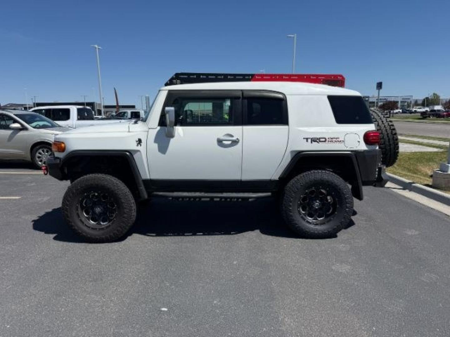2012 WHITE /CLOTH Toyota FJ Cruiser (JTEBU4BF0CK) with an 40L V6 engine, Automatic transmission, located at 1175 N Woodruff Ave, Idaho Falls, ID, 83401, 43.506901, -111.999657 - At Timberline Auto, finding a great deal on your next vehicle is always easy! Our experienced sales staff goal is to help find you the right vehicle at the right price! Our knowledgeable finance department has options for almost any credit score. We offer extended service contract options to prot- Photo#1