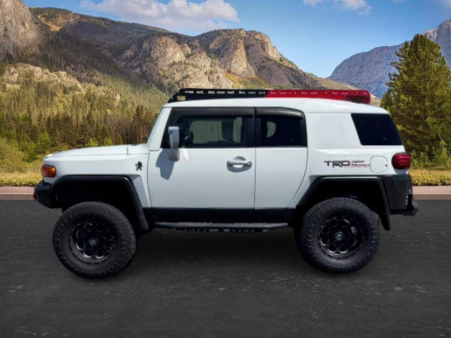 2012 WHITE /CLOTH Toyota FJ Cruiser (JTEBU4BF0CK) with an 40L V6 engine, Automatic transmission, located at 1175 N Woodruff Ave, Idaho Falls, ID, 83401, 43.506901, -111.999657 - At Timberline Auto, finding a great deal on your next vehicle is always easy! Our experienced sales staff goal is to help find you the right vehicle at the right price! Our knowledgeable finance department has options for almost any credit score. We offer extended service contract options to prot- Photo#0
