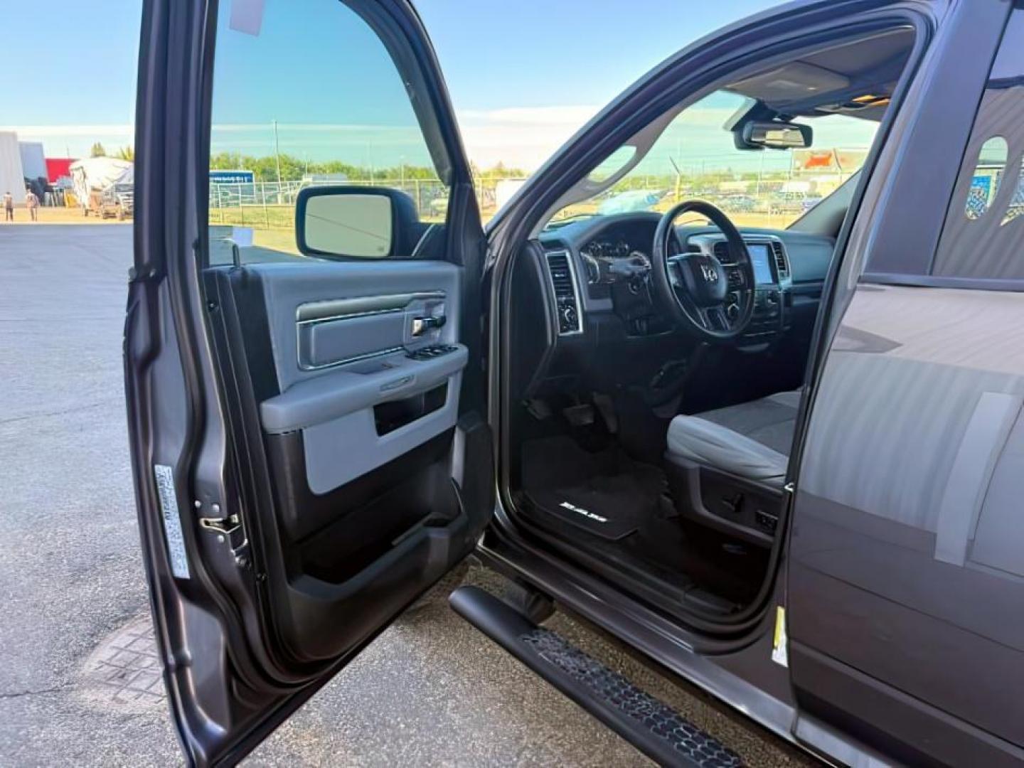 2019 GRAY /Diesel Gray/Black Ram 1500 Classic (1C6RR7LT6KS) with an HEMI 57L V-8 variable valve control engine, Automatic transmission, located at 1175 N Woodruff Ave, Idaho Falls, ID, 83401, 43.506901, -111.999657 - At Timberline Auto, finding a great deal on your next vehicle is always easy! Our experienced sales staff goal is to help find you the right vehicle at the right price! Our knowledgeable finance department has options for almost any credit score. We offer extended service contract options to prot - Photo#12