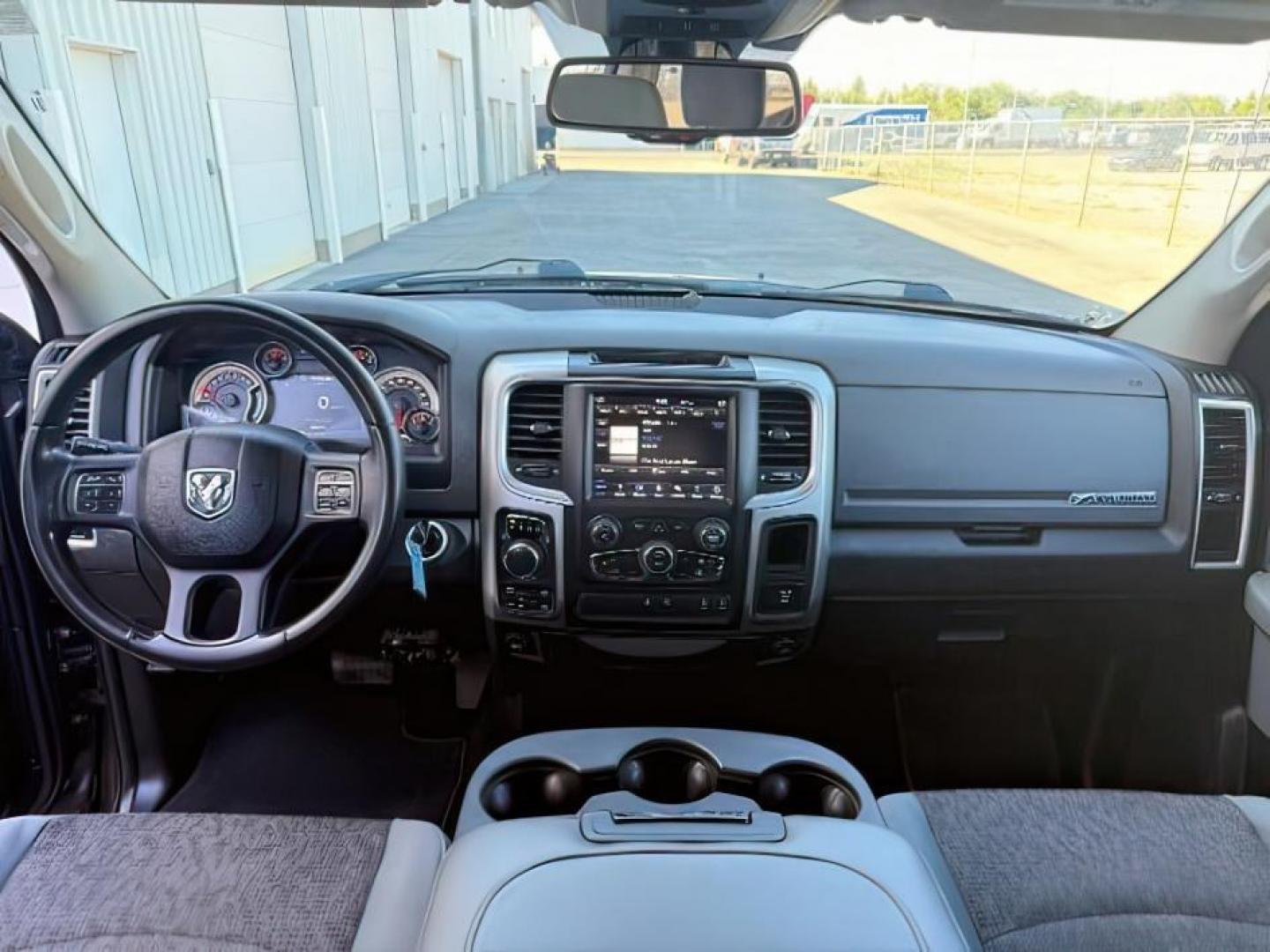 2019 GRAY /Diesel Gray/Black Ram 1500 Classic (1C6RR7LT6KS) with an HEMI 57L V-8 variable valve control engine, Automatic transmission, located at 1175 N Woodruff Ave, Idaho Falls, ID, 83401, 43.506901, -111.999657 - At Timberline Auto, finding a great deal on your next vehicle is always easy! Our experienced sales staff goal is to help find you the right vehicle at the right price! Our knowledgeable finance department has options for almost any credit score. We offer extended service contract options to prot - Photo#24