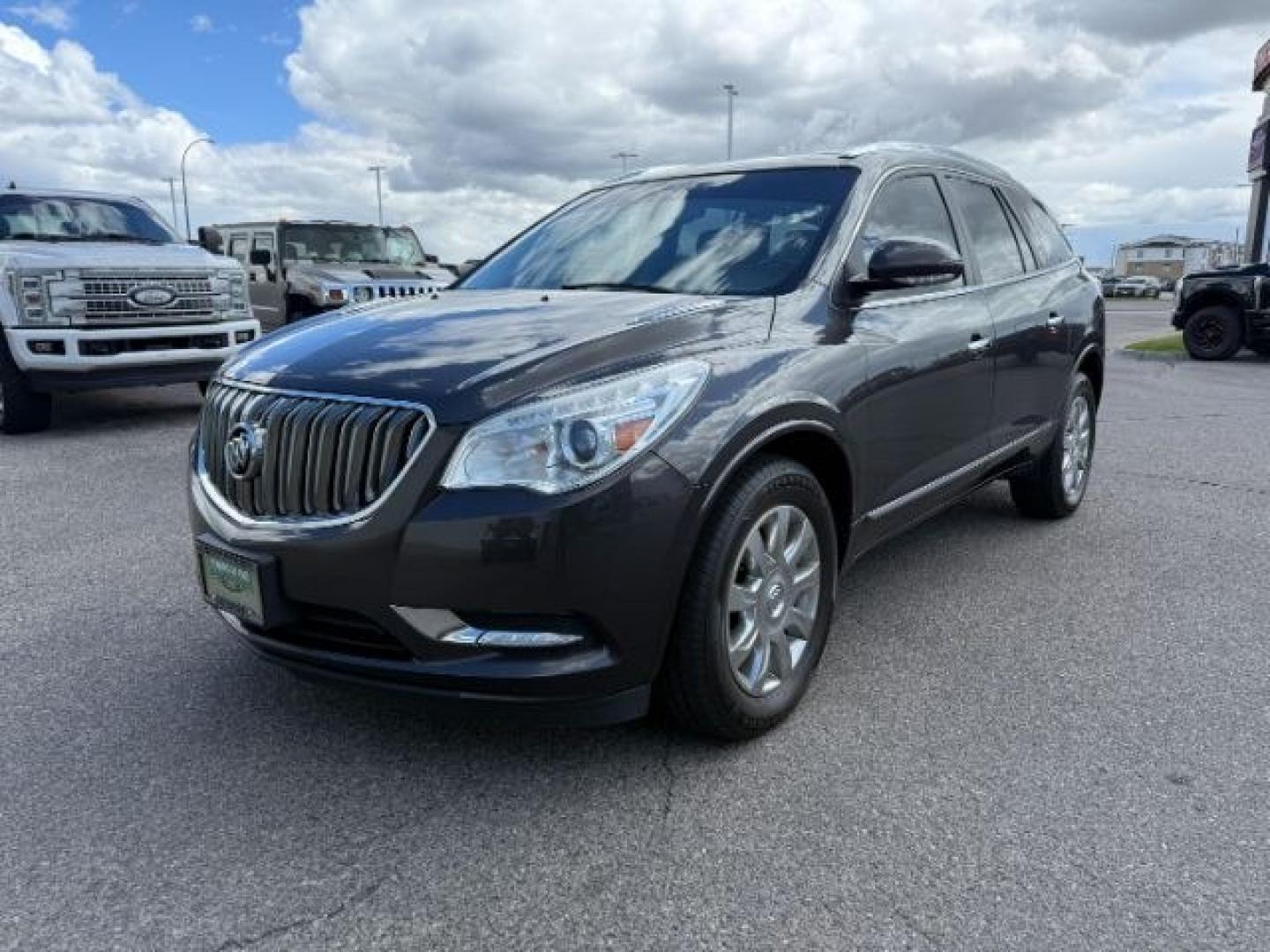 2016 GRAY /Ebony w/Ebony Accents Buick Enclave (5GAKVBKD2GJ) with an 36L V-6 gasoline direct injection engine, Automatic transmission, located at 1175 N Woodruff Ave, Idaho Falls, ID, 83401, 43.506901, -111.999657 - 2016 Buick Enclave Leather AWD powered by a 3.6L V6 engine with automatic transmission. Full-size 3-row SUV offering seating for up to seven passengers with a comfortable, quiet ride and strong highway performance. Features include leather interior, tri-zone climate control, touchscreen infotainment- Photo#0