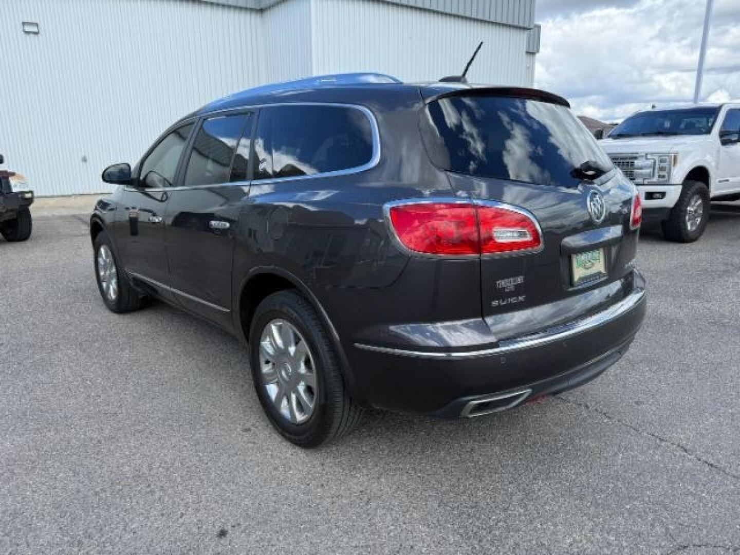 2016 GRAY /Ebony w/Ebony Accents Buick Enclave (5GAKVBKD2GJ) with an 36L V-6 gasoline direct injection engine, Automatic transmission, located at 1175 N Woodruff Ave, Idaho Falls, ID, 83401, 43.506901, -111.999657 - 2016 Buick Enclave Leather AWD powered by a 3.6L V6 engine with automatic transmission. Full-size 3-row SUV offering seating for up to seven passengers with a comfortable, quiet ride and strong highway performance. Features include leather interior, tri-zone climate control, touchscreen infotainment- Photo#2