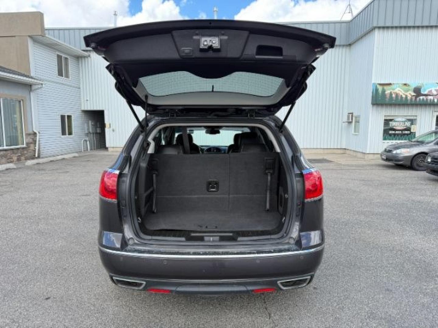2016 GRAY /Ebony w/Ebony Accents Buick Enclave (5GAKVBKD2GJ) with an 36L V-6 gasoline direct injection engine, Automatic transmission, located at 1175 N Woodruff Ave, Idaho Falls, ID, 83401, 43.506901, -111.999657 - 2016 Buick Enclave Leather AWD powered by a 3.6L V6 engine with automatic transmission. Full-size 3-row SUV offering seating for up to seven passengers with a comfortable, quiet ride and strong highway performance. Features include leather interior, tri-zone climate control, touchscreen infotainment- Photo#5