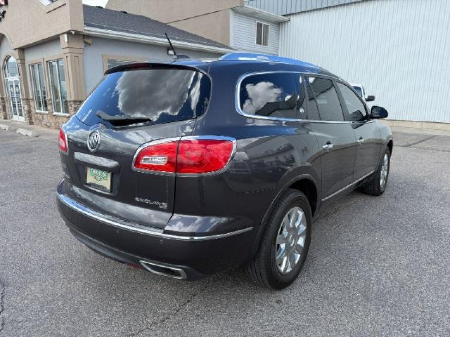 2016 GRAY /Ebony w/Ebony Accents Buick Enclave (5GAKVBKD2GJ) with an 36L V-6 gasoline direct injection engine, Automatic transmission, located at 1175 N Woodruff Ave, Idaho Falls, ID, 83401, 43.506901, -111.999657 - 2016 Buick Enclave Leather AWD powered by a 3.6L V6 engine with automatic transmission. Full-size 3-row SUV offering seating for up to seven passengers with a comfortable, quiet ride and strong highway performance. Features include leather interior, tri-zone climate control, touchscreen infotainment- Photo#8