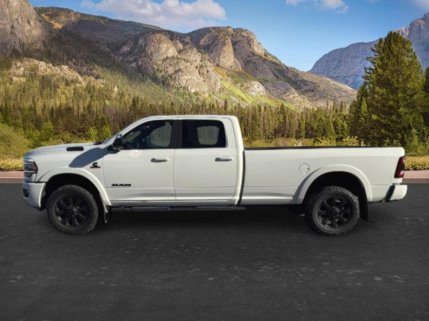 2020 Pearl White /Black Ram 2500 Laramie Crew Cab 4x4 8' Box (3C6UR5KLXLG) with an Cummins 6.7L I-6 diesel direct injection engine, AUTOMATIC transmission, located at 1235 N Woodruff Ave., Idaho Falls, 83401, (208) 523-1053, 43.507172, -112.000488 - At Timberline Auto, finding a great deal on your next vehicle is always easy! Our experienced sales staff goal is to help find you the right vehicle at the right price! Our knowledgeable finance department has options for almost any credit score. We offer extended service contract options to prot - Photo#0