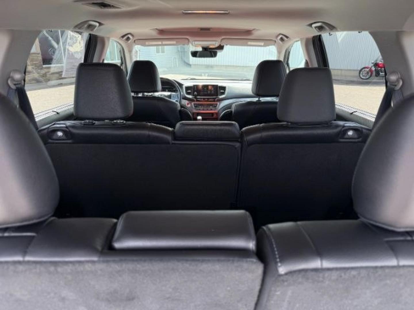 2019 BLACK /Black Honda Pilot EX-L (5FNYF6H58KB) with an 3.5L V-6 gasoline direct injection engine, AUTOMATIC transmission, located at 1235 N Woodruff Ave., Idaho Falls, 83401, (208) 523-1053, 43.507172, -112.000488 - At Timberline Auto, finding a great deal on your next vehicle is always easy! Our experienced sales staff goal is to help find you the right vehicle at the right price! Our knowledgeable finance department has options for almost any credit score. We offer extended service contract options to prot - Photo#38