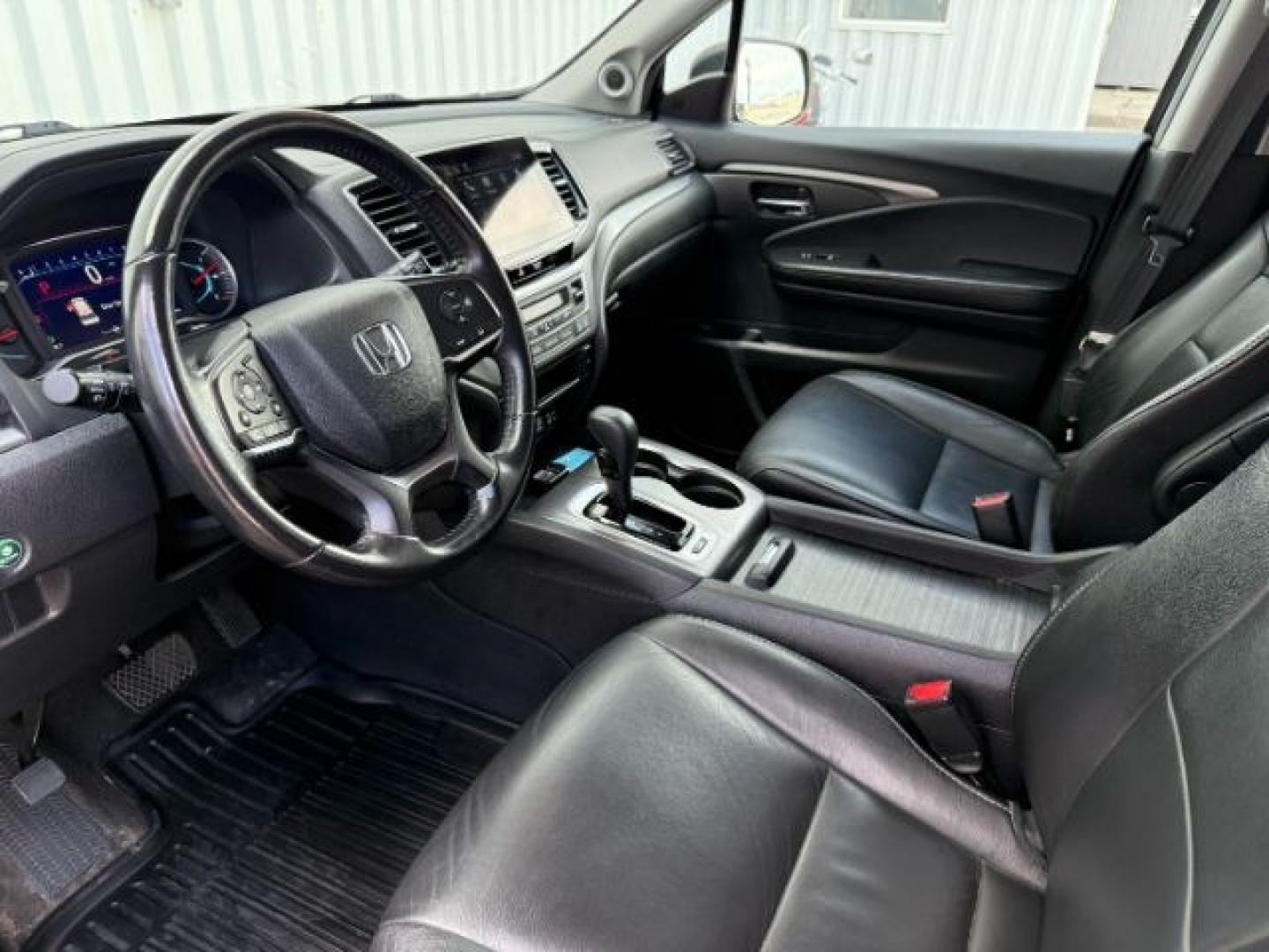 2019 BLACK /Black Honda Pilot EX-L (5FNYF6H58KB) with an 3.5L V-6 gasoline direct injection engine, AUTOMATIC transmission, located at 1235 N Woodruff Ave., Idaho Falls, 83401, (208) 523-1053, 43.507172, -112.000488 - At Timberline Auto, finding a great deal on your next vehicle is always easy! Our experienced sales staff goal is to help find you the right vehicle at the right price! Our knowledgeable finance department has options for almost any credit score. We offer extended service contract options to prot - Photo#47
