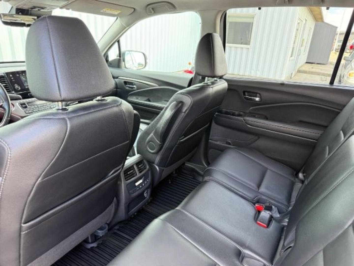2019 BLACK /Black Honda Pilot EX-L (5FNYF6H58KB) with an 3.5L V-6 gasoline direct injection engine, AUTOMATIC transmission, located at 1235 N Woodruff Ave., Idaho Falls, 83401, (208) 523-1053, 43.507172, -112.000488 - At Timberline Auto, finding a great deal on your next vehicle is always easy! Our experienced sales staff goal is to help find you the right vehicle at the right price! Our knowledgeable finance department has options for almost any credit score. We offer extended service contract options to prot - Photo#60