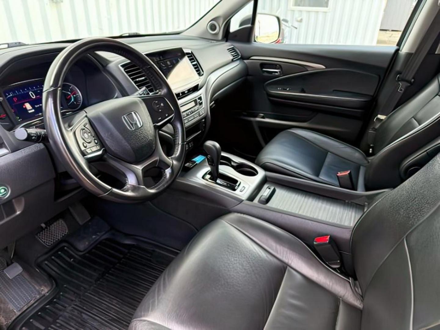 2019 BLACK /Black Honda Pilot EX-L (5FNYF6H58KB) with an 3.5L V-6 gasoline direct injection engine, AUTOMATIC transmission, located at 1235 N Woodruff Ave., Idaho Falls, 83401, (208) 523-1053, 43.507172, -112.000488 - At Timberline Auto, finding a great deal on your next vehicle is always easy! Our experienced sales staff goal is to help find you the right vehicle at the right price! Our knowledgeable finance department has options for almost any credit score. We offer extended service contract options to prot - Photo#16