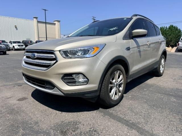2018 GOLD /Medium Light Stone Ford Escape (1FMCU9HD3JU) with an EcoBoost 15L I-4 gasoline direct injection engine, Automatic transmission, located at 1175 N Woodruff Ave, Idaho Falls, ID, 83401, 43.506901, -111.999657- Photo#26