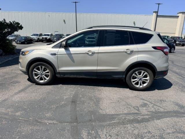 2018 GOLD /Medium Light Stone Ford Escape (1FMCU9HD3JU) with an EcoBoost 15L I-4 gasoline direct injection engine, Automatic transmission, located at 1175 N Woodruff Ave, Idaho Falls, ID, 83401, 43.506901, -111.999657- Photo#27