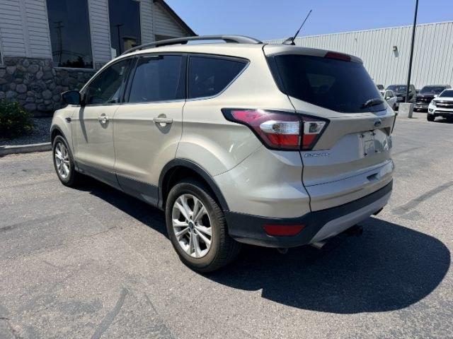 2018 GOLD /Medium Light Stone Ford Escape (1FMCU9HD3JU) with an EcoBoost 15L I-4 gasoline direct injection engine, Automatic transmission, located at 1175 N Woodruff Ave, Idaho Falls, ID, 83401, 43.506901, -111.999657- Photo#28