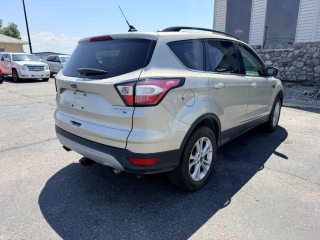 2018 GOLD /Medium Light Stone Ford Escape (1FMCU9HD3JU) with an EcoBoost 15L I-4 gasoline direct injection engine, Automatic transmission, located at 1175 N Woodruff Ave, Idaho Falls, ID, 83401, 43.506901, -111.999657- Photo#32