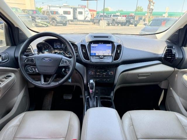 2018 GOLD /Medium Light Stone Ford Escape (1FMCU9HD3JU) with an EcoBoost 15L I-4 gasoline direct injection engine, Automatic transmission, located at 1175 N Woodruff Ave, Idaho Falls, ID, 83401, 43.506901, -111.999657- Photo#48