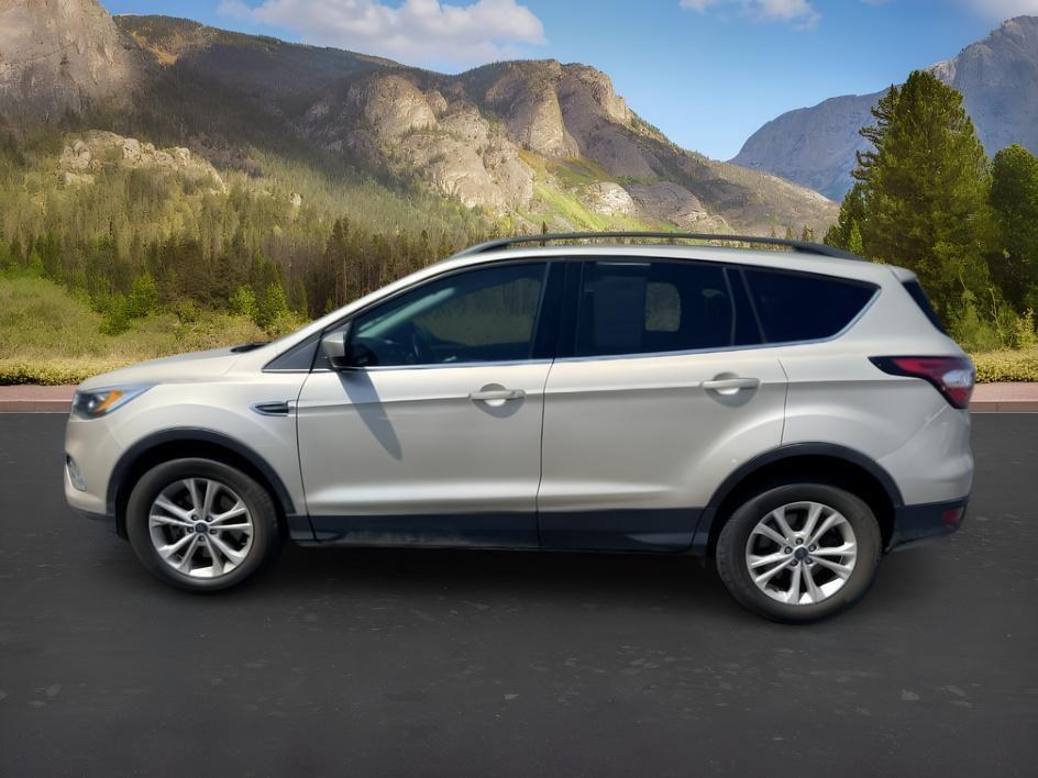 2018 GOLD /Medium Light Stone Ford Escape (1FMCU9HD3JU) with an EcoBoost 15L I-4 gasoline direct injection engine, Automatic transmission, located at 1175 N Woodruff Ave, Idaho Falls, ID, 83401, 43.506901, -111.999657- Photo#1