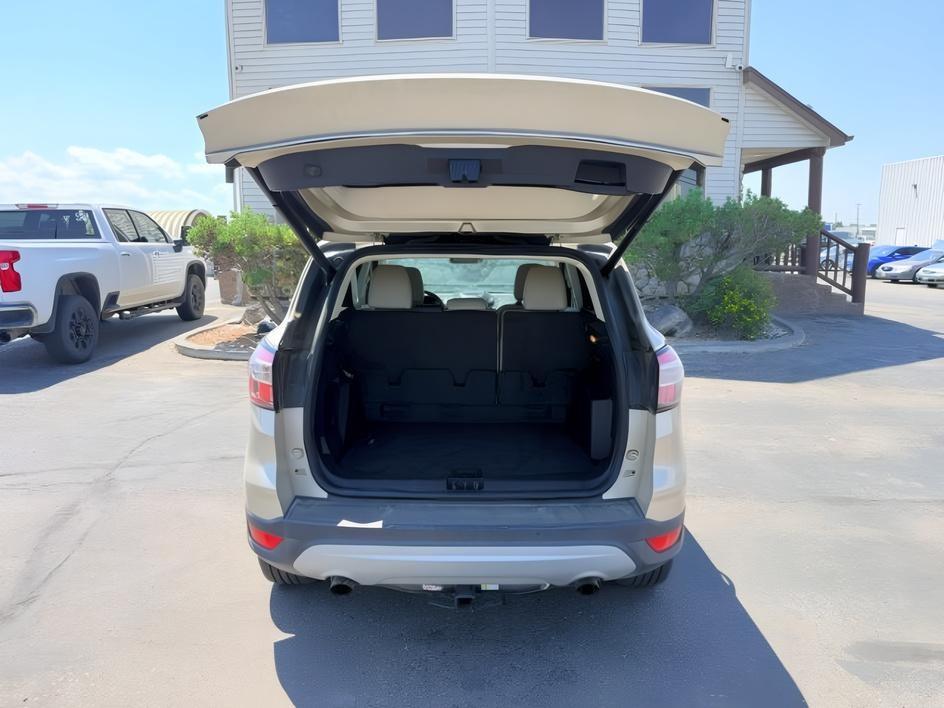 2018 GOLD /Medium Light Stone Ford Escape (1FMCU9HD3JU) with an EcoBoost 15L I-4 gasoline direct injection engine, Automatic transmission, located at 1175 N Woodruff Ave, Idaho Falls, ID, 83401, 43.506901, -111.999657- Photo#4
