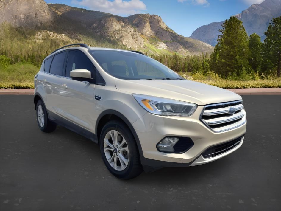 2018 GOLD /Medium Light Stone Ford Escape (1FMCU9HD3JU) with an EcoBoost 15L I-4 gasoline direct injection engine, Automatic transmission, located at 1175 N Woodruff Ave, Idaho Falls, ID, 83401, 43.506901, -111.999657- Photo#8
